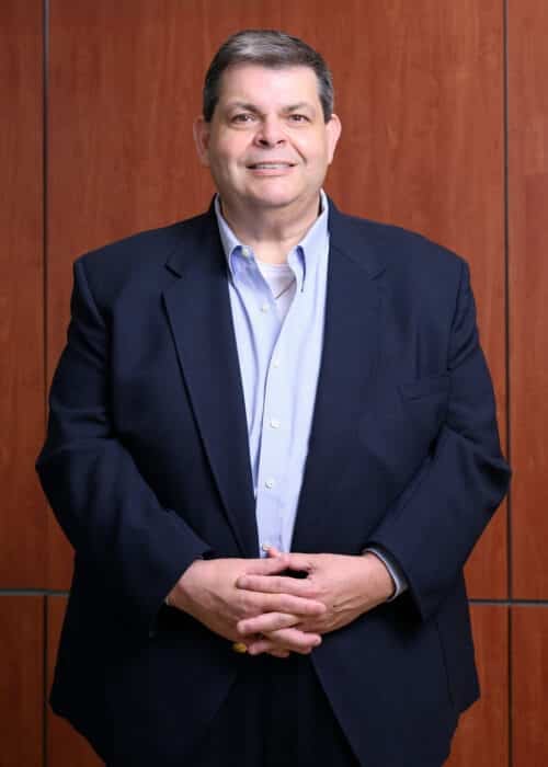 a man wearing a suit and tie