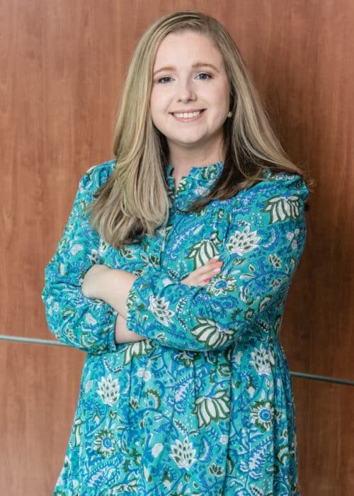 a woman wearing a blue dress