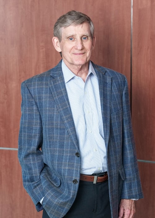 a man wearing a suit and tie