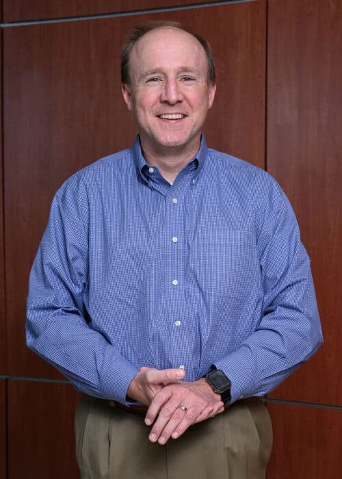 a man in a blue shirt